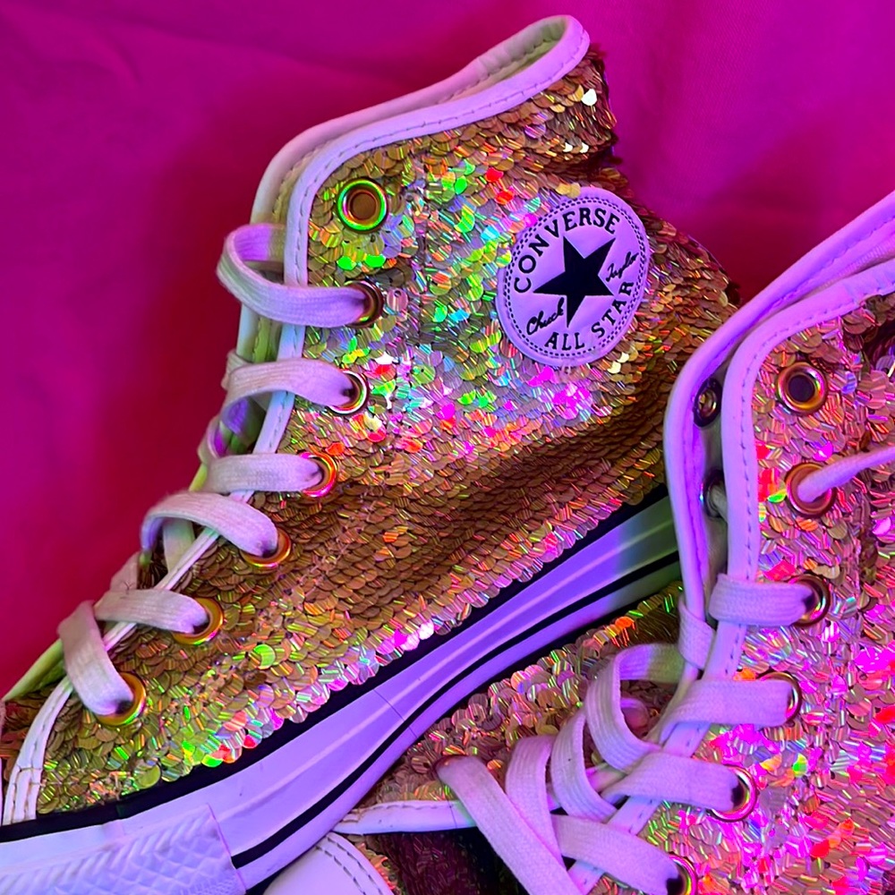 Worn twice sparkly high top converse.